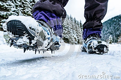 Crampons on hiking boots Stock Photo