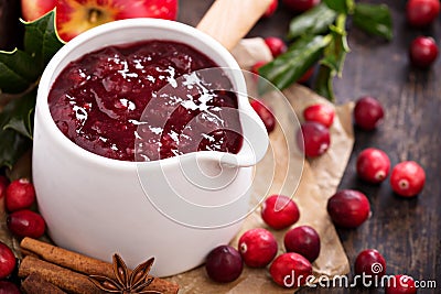 Cranberry sauce in ceramic saucepan Stock Photo