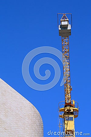 Crane with brick wall Stock Photo