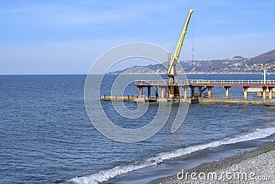 Crane at the cargo berth in Sochi on the Black Sea Stock Photo