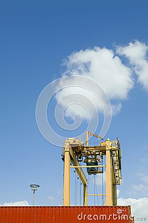 Crane And Cargo Container At Dock Stock Photo