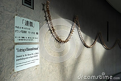 Cranes String for Peace at Nagasaki Atomic Bomb Museum. Editorial Stock Photo