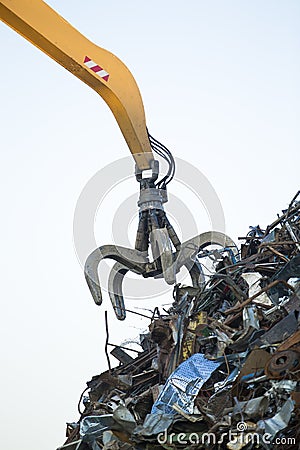 Crane grabber loading metal rusty scrap Stock Photo