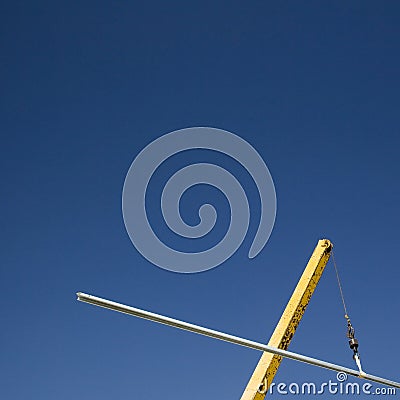 Crane lifting girder Stock Photo