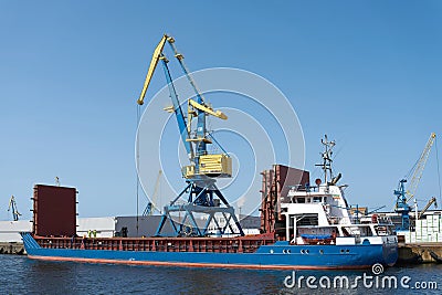 Crane and Ship in the port of the Hanseatic city of Wismar in Germany Editorial Stock Photo