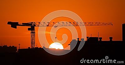 Crane and the sun Stock Photo