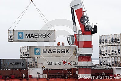 Crane unloads container ship Sevmorput - Russian nuclear-powered icebreaker lighter aboard ship carrier. Container terminal seapor Editorial Stock Photo