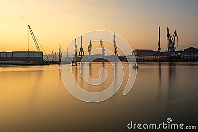 Cranes along the River Nervion in the industrial North of Bilbao, Spain Stock Photo