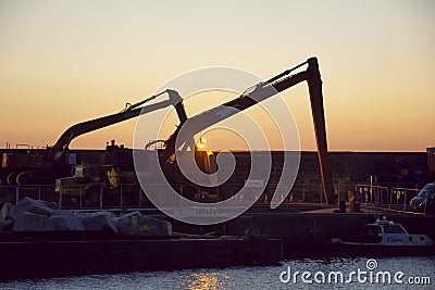 Cranes at Portrush Harbour Editorial Stock Photo