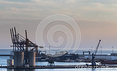 Cranes in a shipyard in the port of Malaga, Spain Editorial Stock Photo