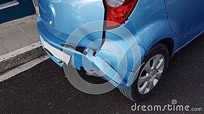 Crashed damaged blue car in the rigth back side Stock Photo