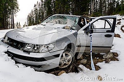 Crashed and ditched car Editorial Stock Photo
