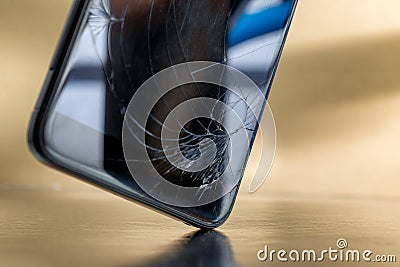 crashed smartphone or phone with broken LCD glass display Stock Photo