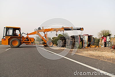 Crashed Truck lies on the road after incident. Editorial Stock Photo