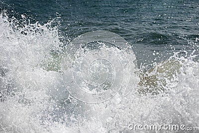 Crashed wave - foam and spray. Mediterranean sea. Tension and struggle conception. Stock Photo