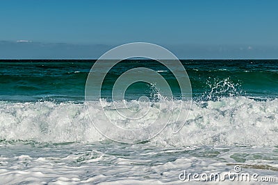 Crashed wave and splashing water on a Black Sea beach Stock Photo