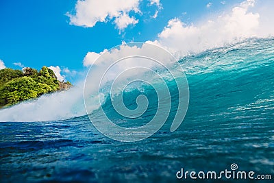 Crashing perfect wave in ocean. Breaking barrel wave Stock Photo