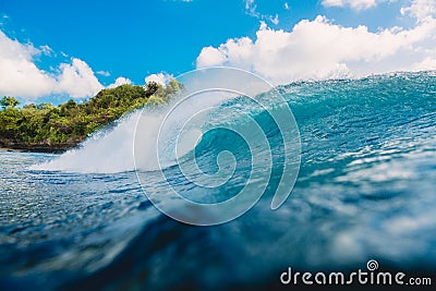 Crashing perfect wave in sea. Breaking barrel wave Stock Photo