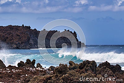 Crashing surf at the rocky shore at La Perouse Bay on Maui. Stock Photo