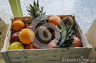 A crate full of organically grown fruits on display Stock Photo