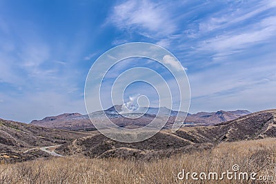 Crater of Mount Naka or Aso Mountain is the largest active volca Stock Photo