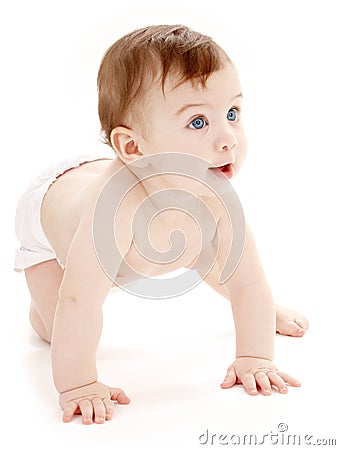 Crawling baby boy looking up Stock Photo