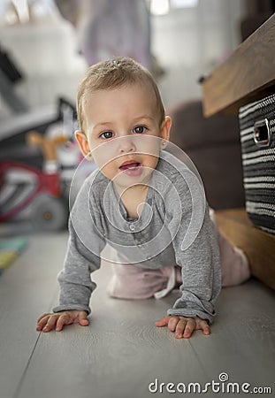 Crawling funny adorable baby Stock Photo