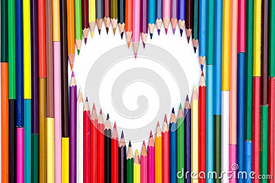 Crayons with white heart Stock Photo