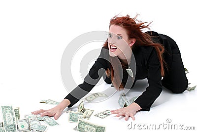 Crazed Business Woman Grabbing Money From Floor Stock Photo