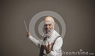 Crazy angry professor yelling and pointing with a stick Stock Photo
