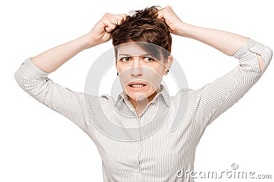 Crazy angry woman tearing her hair on a white Stock Photo