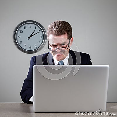 Crazy Businessman on Laptop Computer Stock Photo