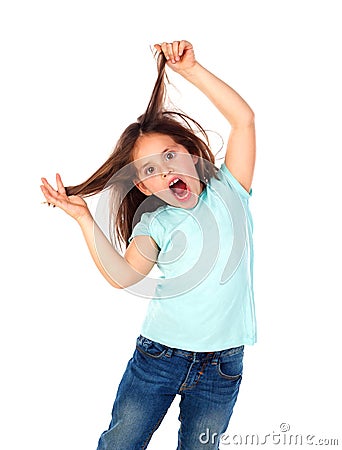 Crazy child girl pullin her hairs Stock Photo