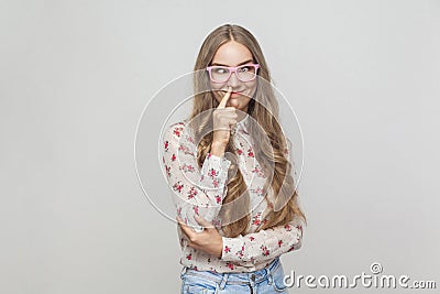 Crazy and comic concept. Funny woman touching nose and have a ha Stock Photo