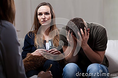 Crazy couple during psychotherapy Stock Photo