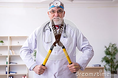 Crazy doctor otologist working in the clinic Stock Photo