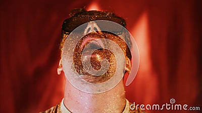 Crazy fun positive face man in gold glitter. Comical photo shake head funny person. Expression emotion guy in sunglasses Stock Photo