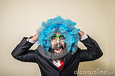 Crazy funny bearded man with blue wig Stock Photo