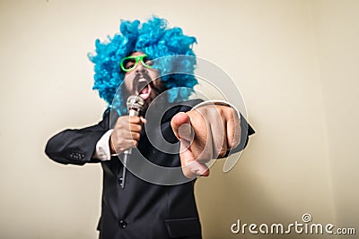 Crazy funny bearded man with blue wig Stock Photo