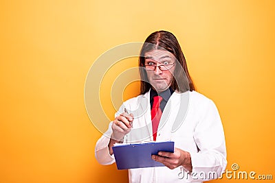 Crazy male doctor looking funny to clipboard Stock Photo