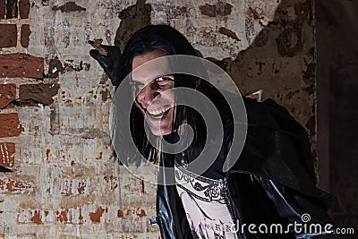 Crazy man with hood Stock Photo