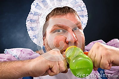 Crazy man with a pacifier Stock Photo