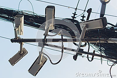 Crazy messy chaos wires cables on Electric poles. Stock Photo