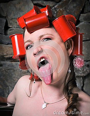 Crazy Rollers Girl Sticking Out Tongue Funny Face Stock Photo