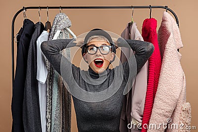 Crazy woman has forgotton to switch off the iron at home Stock Photo