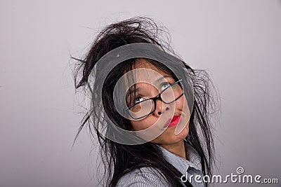 Crazy woman with ruffled hair Stock Photo