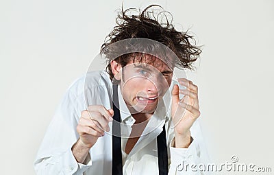 Cracked. A crazy young man going crazy - Isolated. Stock Photo