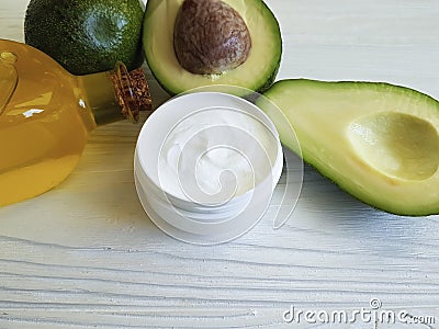 Cream avocado oil wellness on white wooden health handmade care bottle Stock Photo