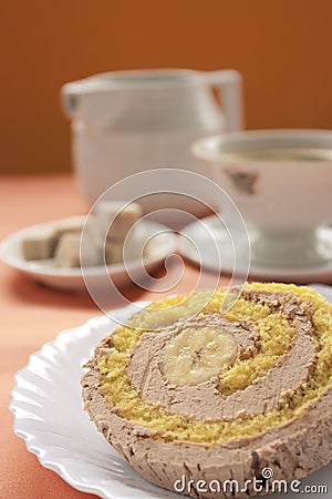 Cream and banana sponge roll Stock Photo