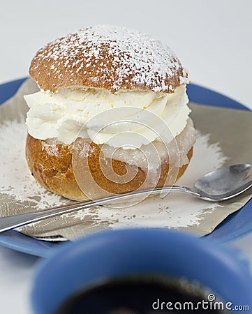 Cream bun with almond paste and coffee Stock Photo